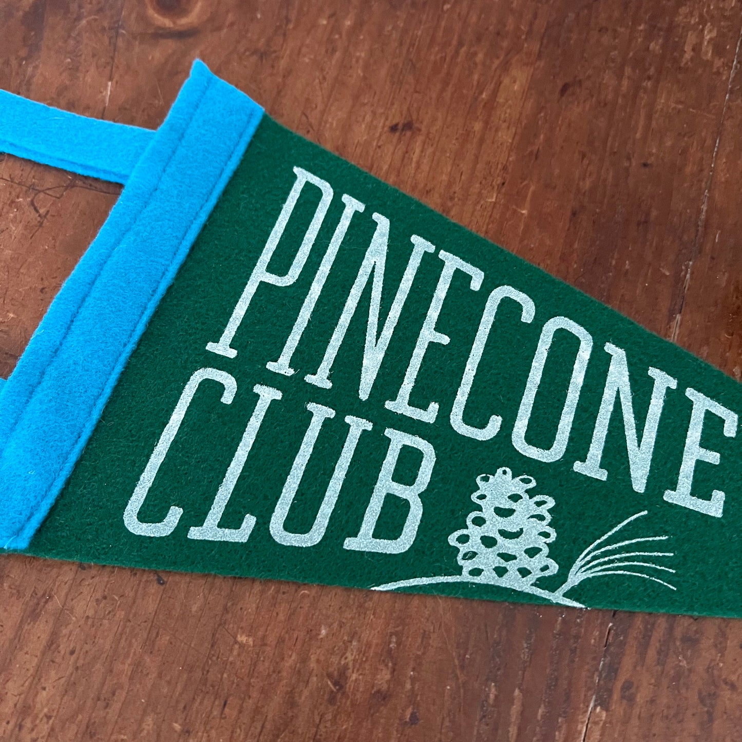 Pinecone Club Felt Pennant 6x12 inches