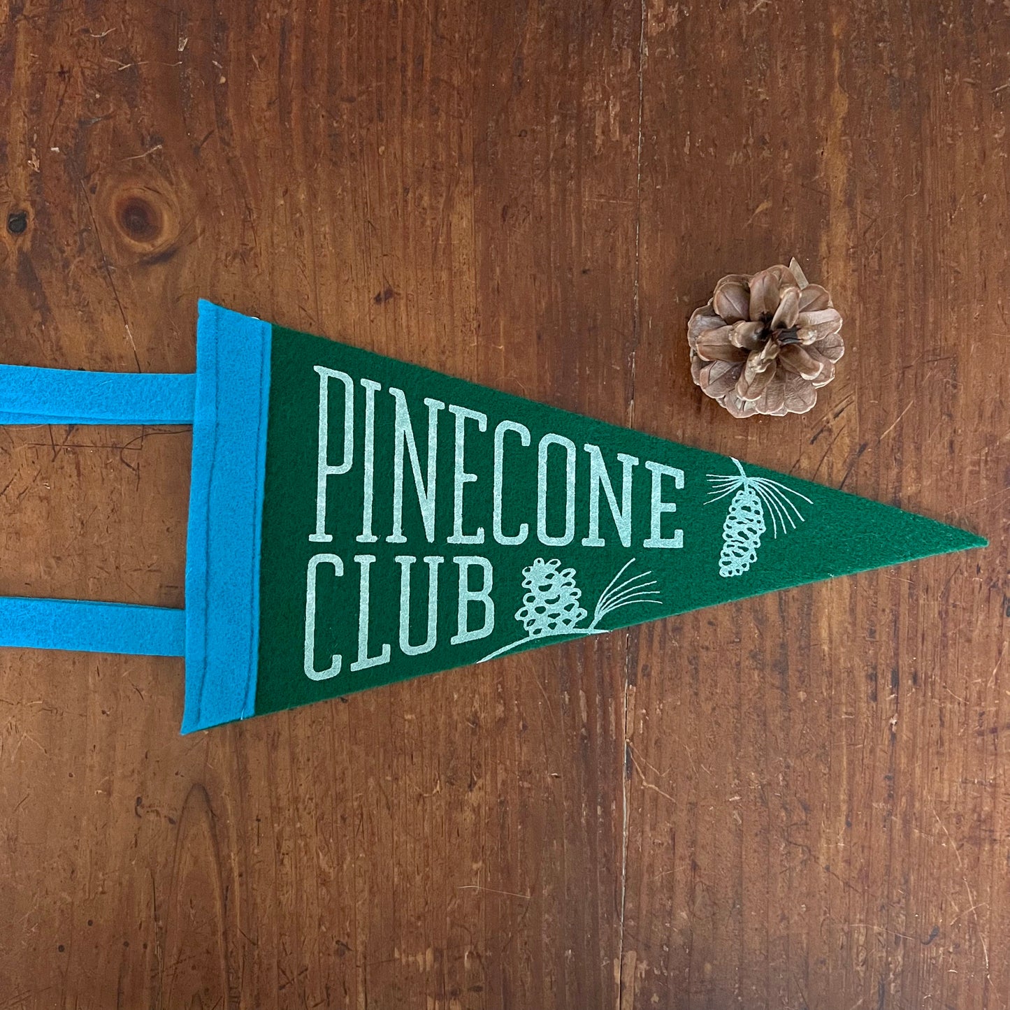 Pinecone Club Felt Pennant 6x12 inches