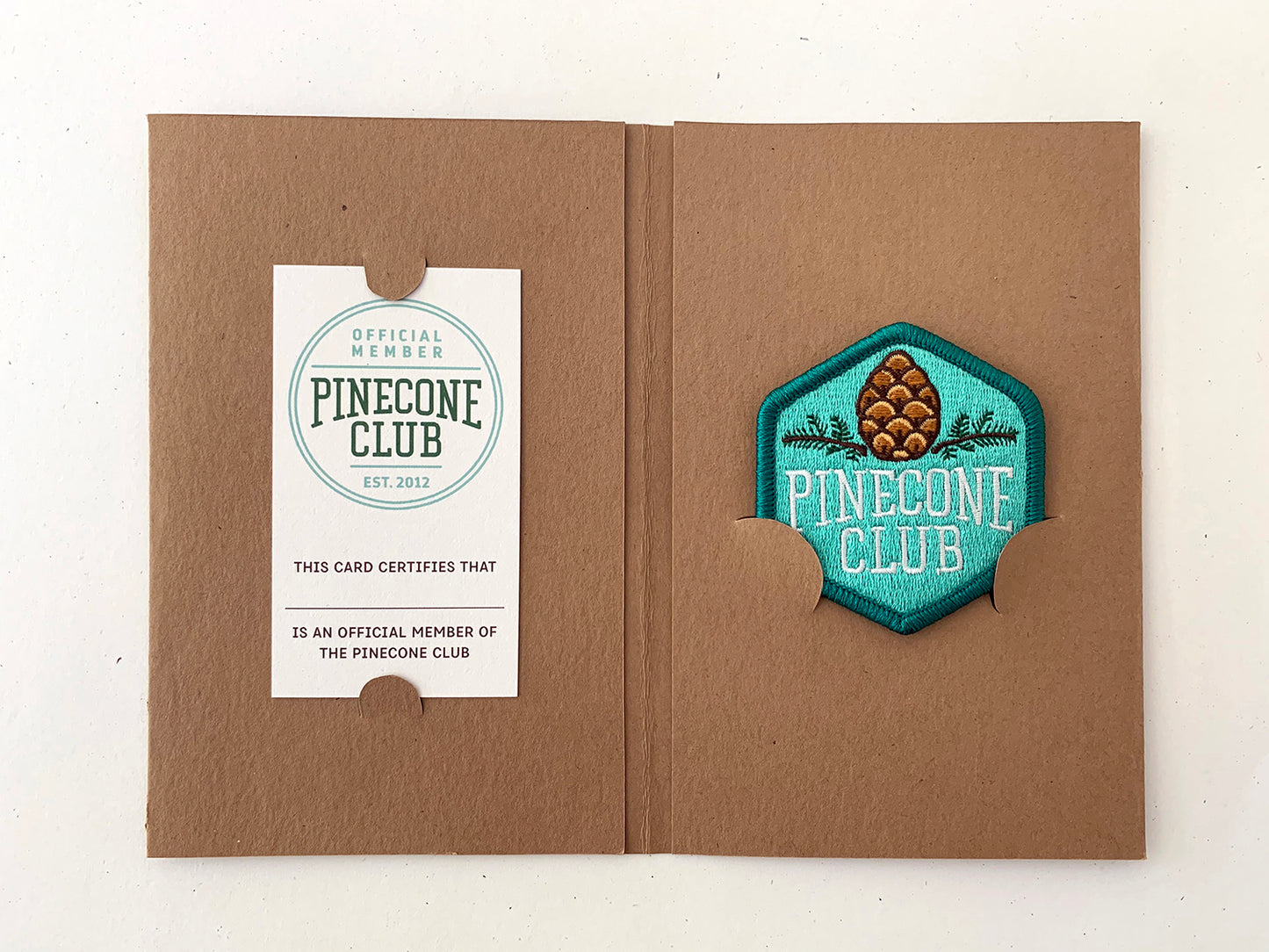 Pinecone Club iron-on patch with optional membership kit